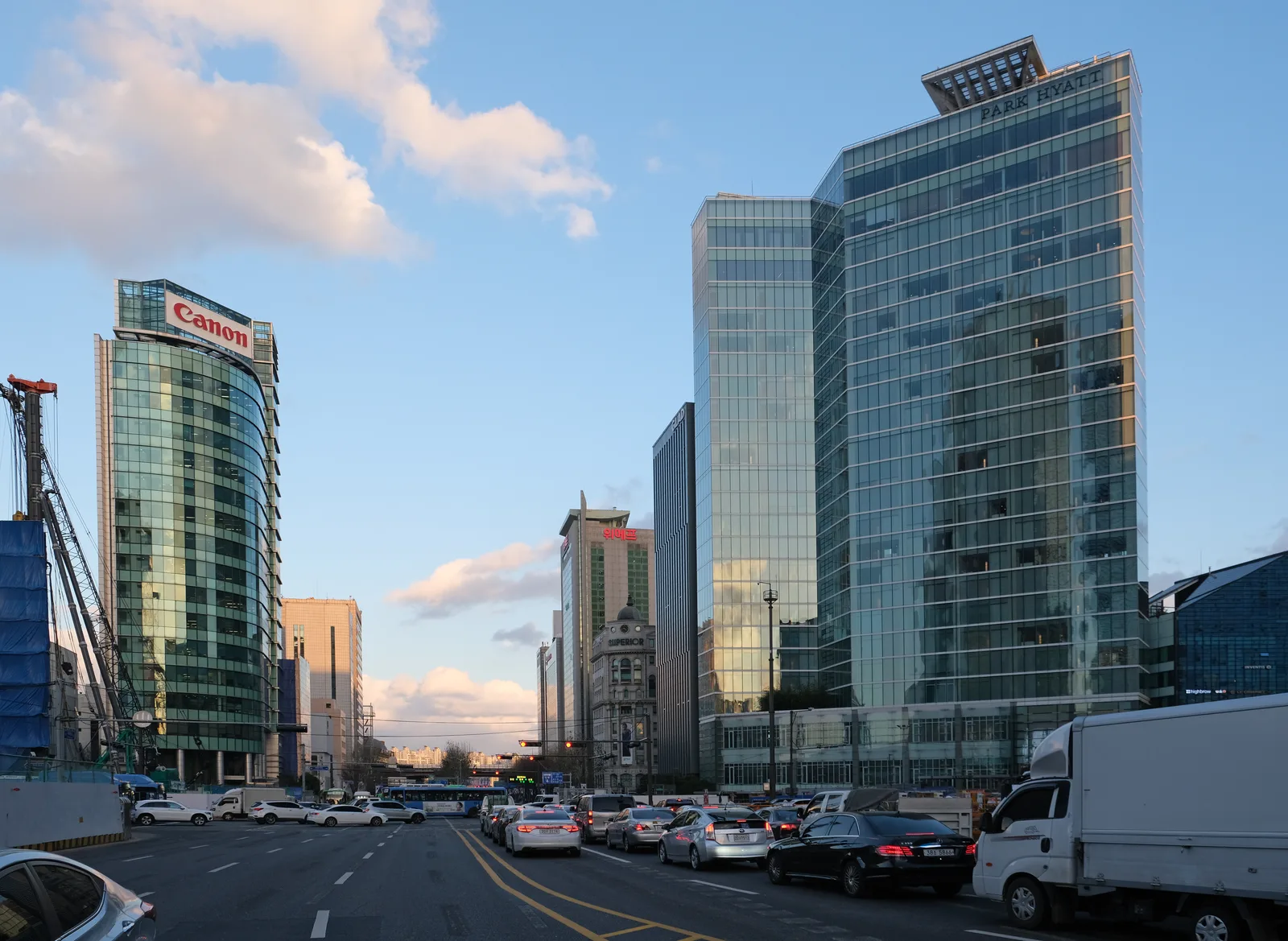 Modern glass office towers along Teheran-ro in Gangnam, Seoul, at dusk