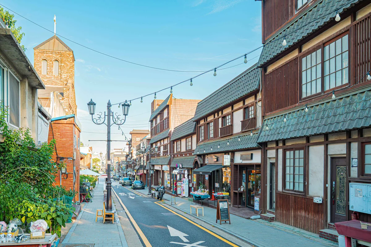 Historic street in Incheon's Gaehangjang Open Port District lined with early 20th century Japanese and Chinese concession-era buildings